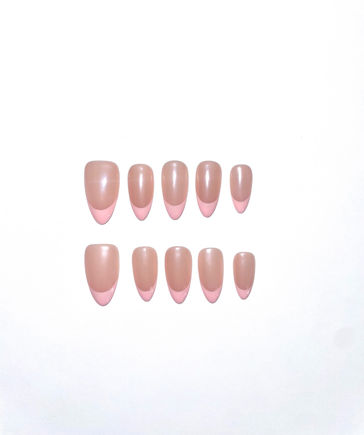 Ten glossy nude-pink almond press-on nails with soft pink French tips